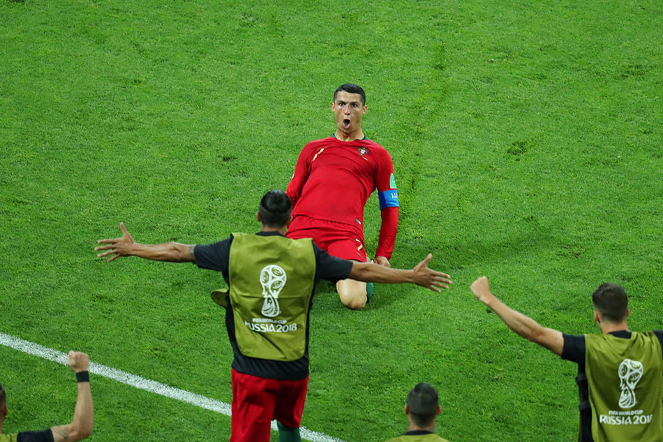 Cristiano Ronaldo hits hat-trick as Portugal deny Spain in six-goal  thriller, World Cup 2018