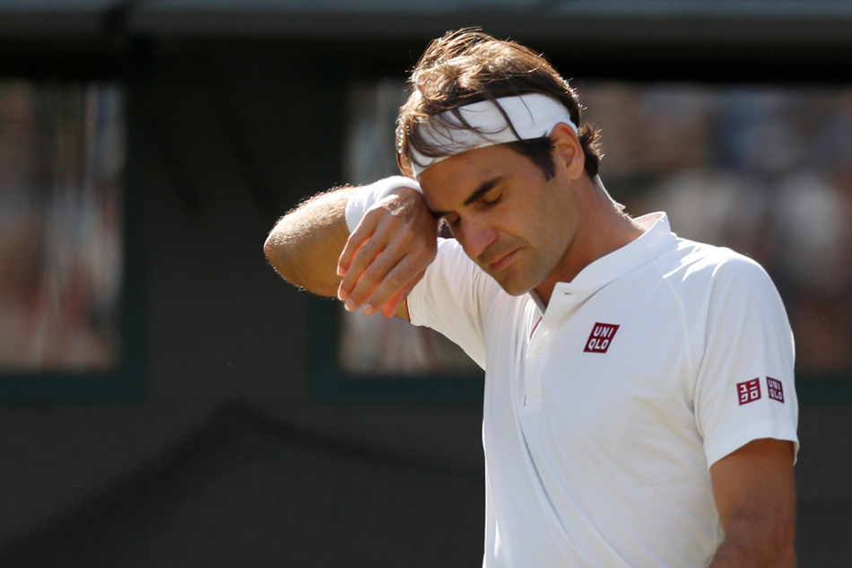 Tennis: Federer suffers shock Wimbledon quarterfinal loss