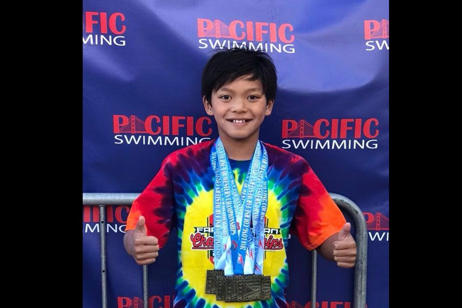 Fil-Am Clark Kent breaks Michael Phelps' 23-year old record