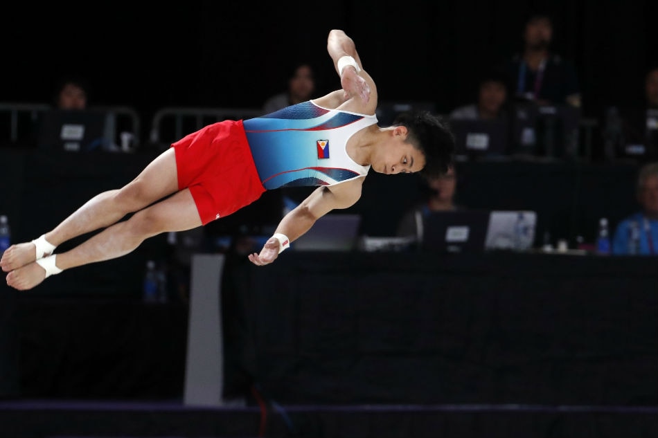 Gymnastics: Carlos Yulo renews Olympic bid at world tilt 1