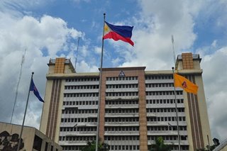 Councilor wants fees at QC hall parking building suspended