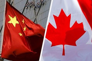 China sets court hearings for 2 Canadians charged with spying