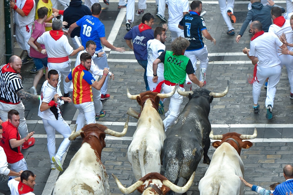 spanish bull run festival ends with 8 people gored abs cbn news spanish bull run festival ends with 8