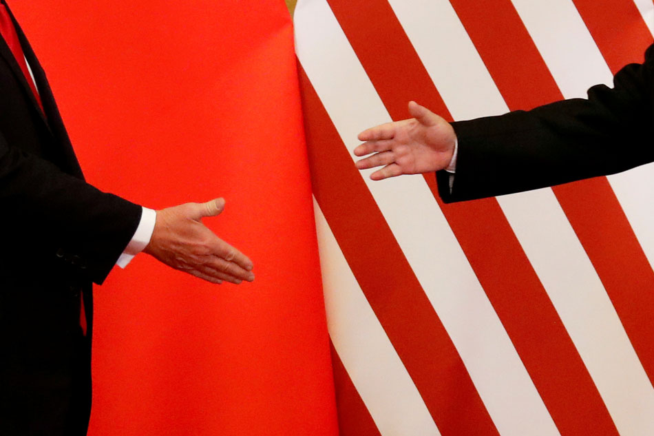 Trump delays tariff hike on Chinese goods, citing trade talk progress 1
