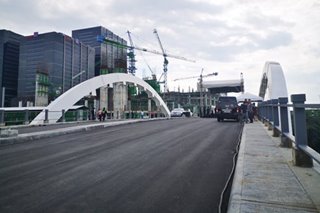 Robinsons' first township features QC-Pasig bridge