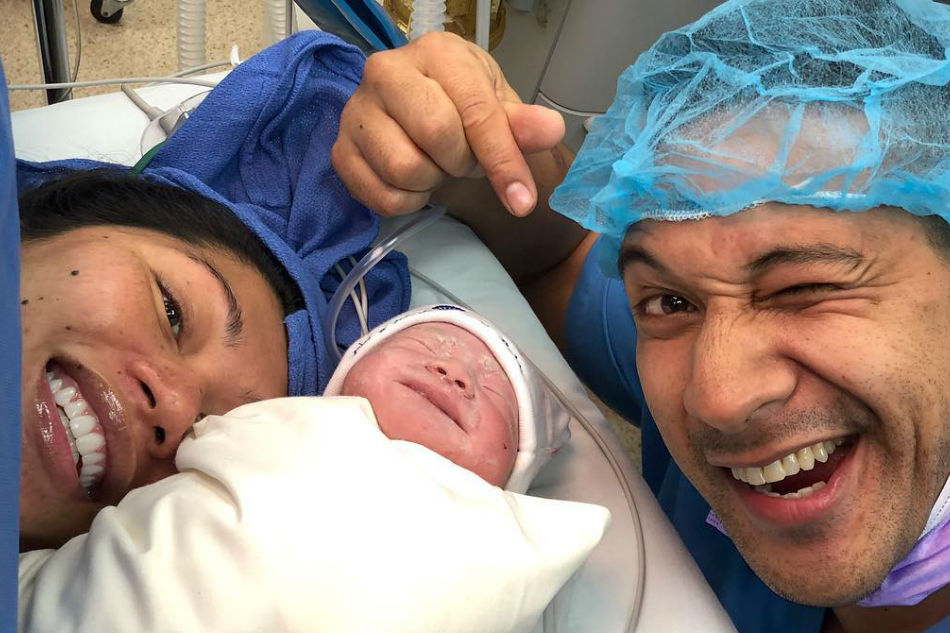 'Our first family photo': Eric Tai, wife welcome baby son Legend | ABS ...