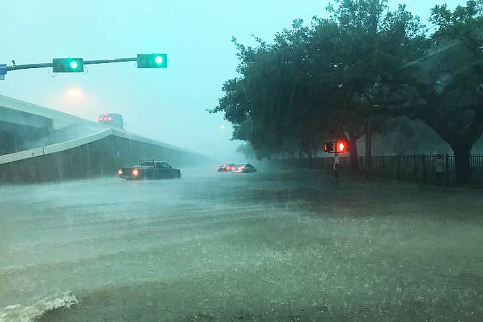 Torrential rains kill 1, flood homes in Houston 1