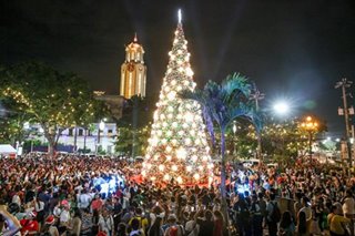 Giant Christmas tree lights up Manila