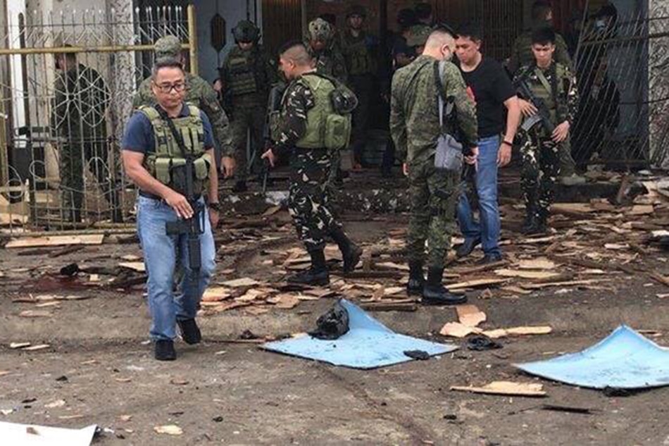 Several killed, dozens wounded in twin blasts at Jolo church 4