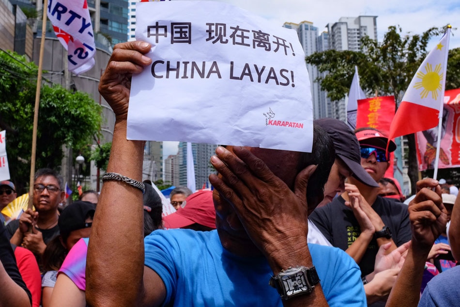 Protesters from different groups march towards the Chinese Consulate in Makati to mark 'Araw ng Kagitingan' on April 9, 2019. The protesters urged President Duterte to uphold national sovereignty as China continues to occupy the disputed islands in the West Philippine Sea. George Calvelo, ABS-CBN News
