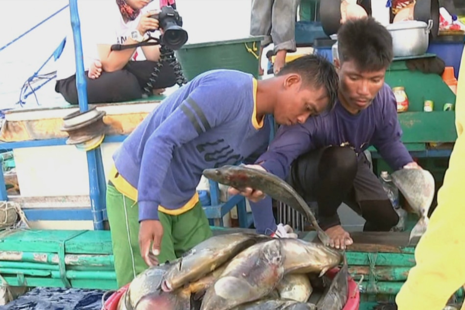 Fish for alcohol, noodles: Filipino fishermen barter with Chinese at ...