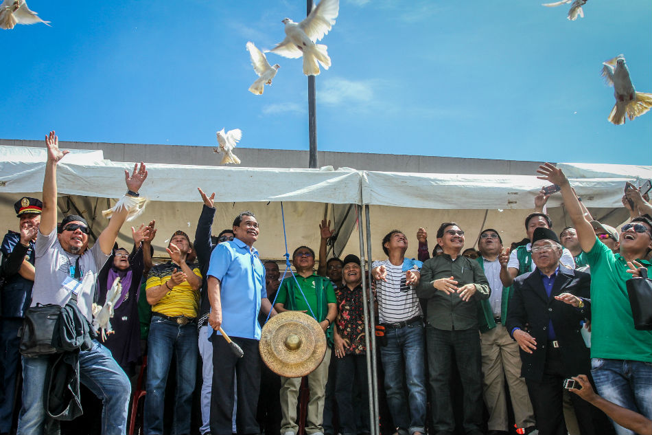 FILE: Moro Islamic Liberation Front release doves into the air as a gesture of peace in this file photo taken on Dec. 10, 2018. Former President Rodrigo Duterte on April 24, 2019 ordered the start of a decommissioning and reintegration process called normalization. Manman Dejeto, ABS-CBN News