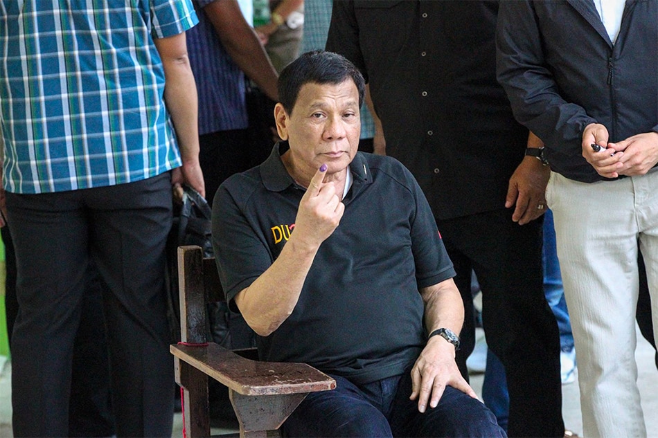 Duterte casts vote in high-stakes midterm polls 1