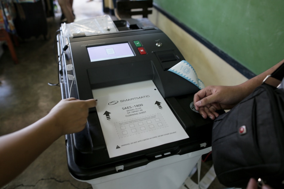  FILE. A malfunctioning vote-counting machine is tested at the Tomas Morato Elementary School in Quezon City, May 13, 2019. Fernando G. Sepe Jr., ABS-CBN News/file