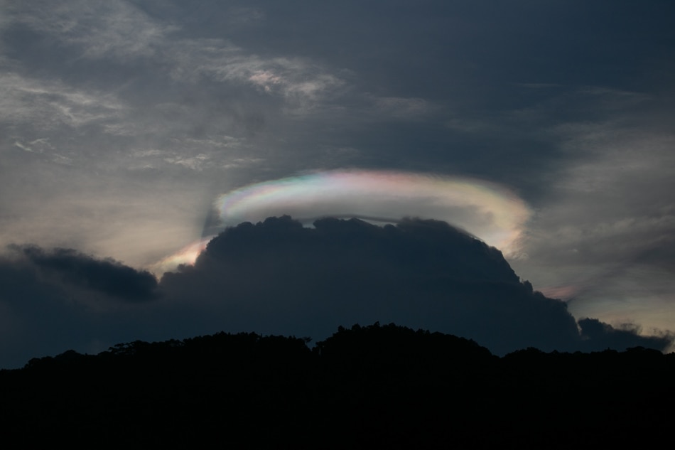 Rainbow halo over Angat reservoir