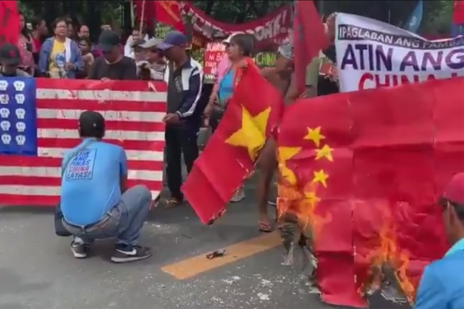 Ahead of Duterte's SONA, protesters burn Chinese flags | ABS-CBN News