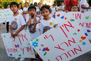 Israel delays ouster of Filipina worker, Israeli-born son