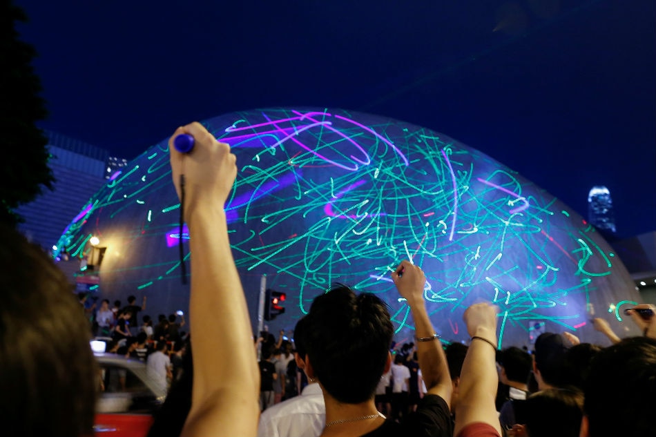 Hong Kong protesters gather for &#39;laser show&#39; rally 1