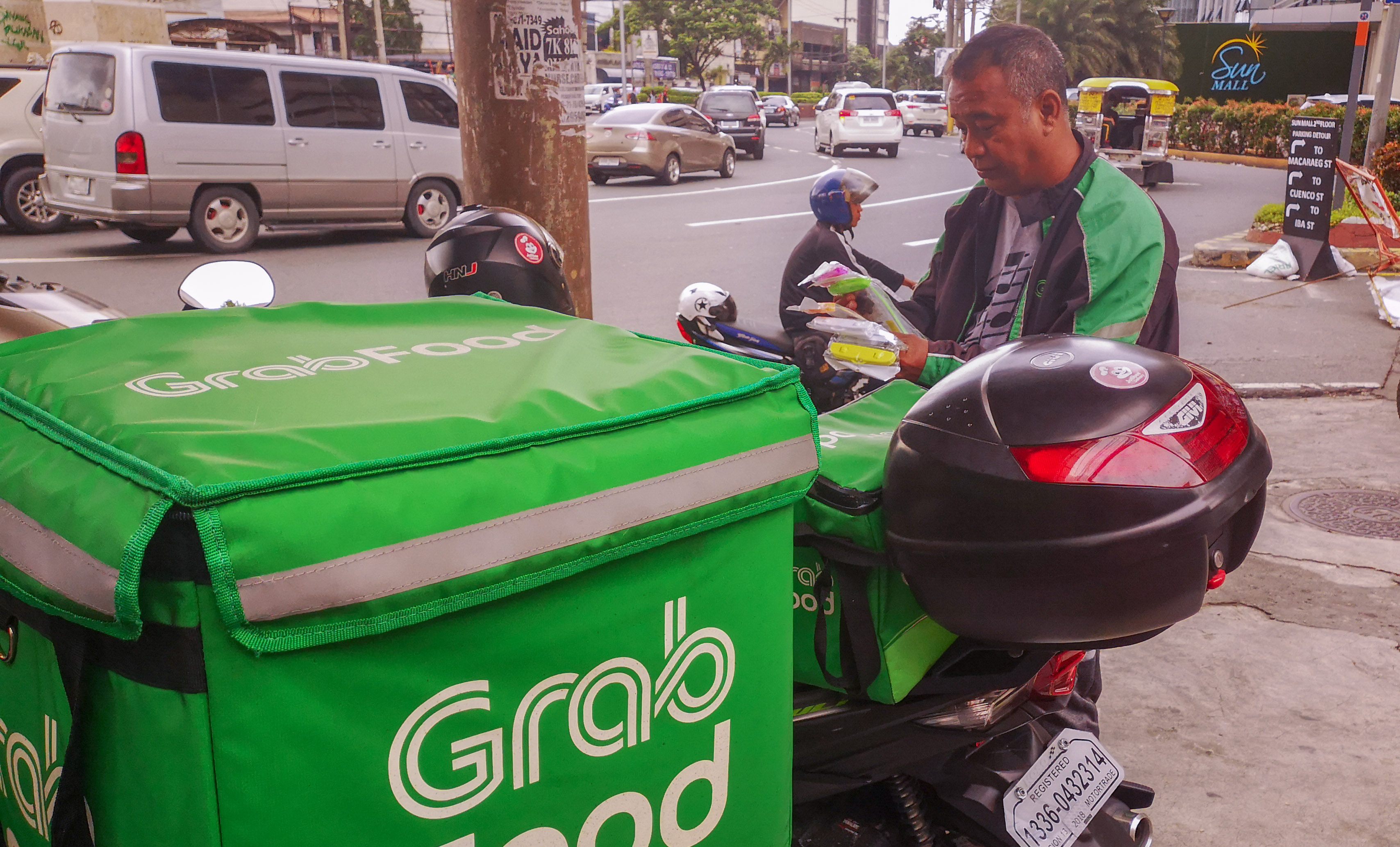 Motorcycle taxis beat metro gridlocks, satisfy milk tea cravings 3
