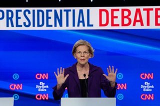 Warren under attack on healthcare, taxes at US Democratic presidential debate