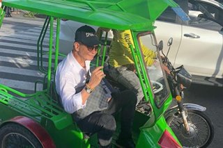 Commute challenge again? Panelo rides a tricycle in Bacolod