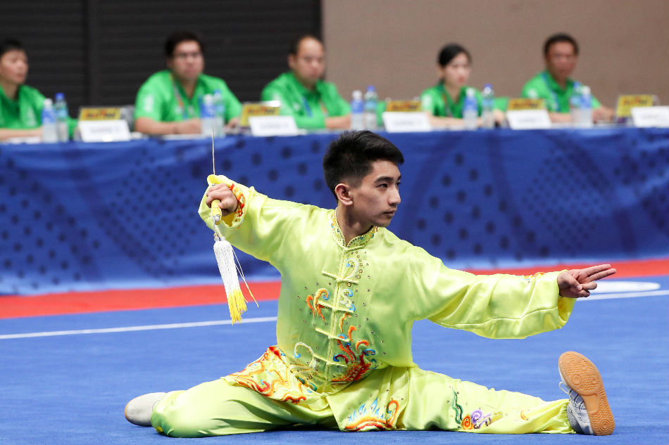 Jones Inso competes in the men's taijijian event of wushu in the 30th Southeast Asian Games. George Calvelo, ABS-CBN News/File