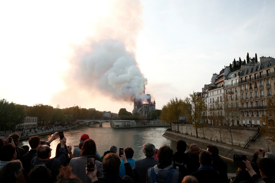&#39;Paris is disfigured&#39;: Tears and shock as Notre-Dame burns 1