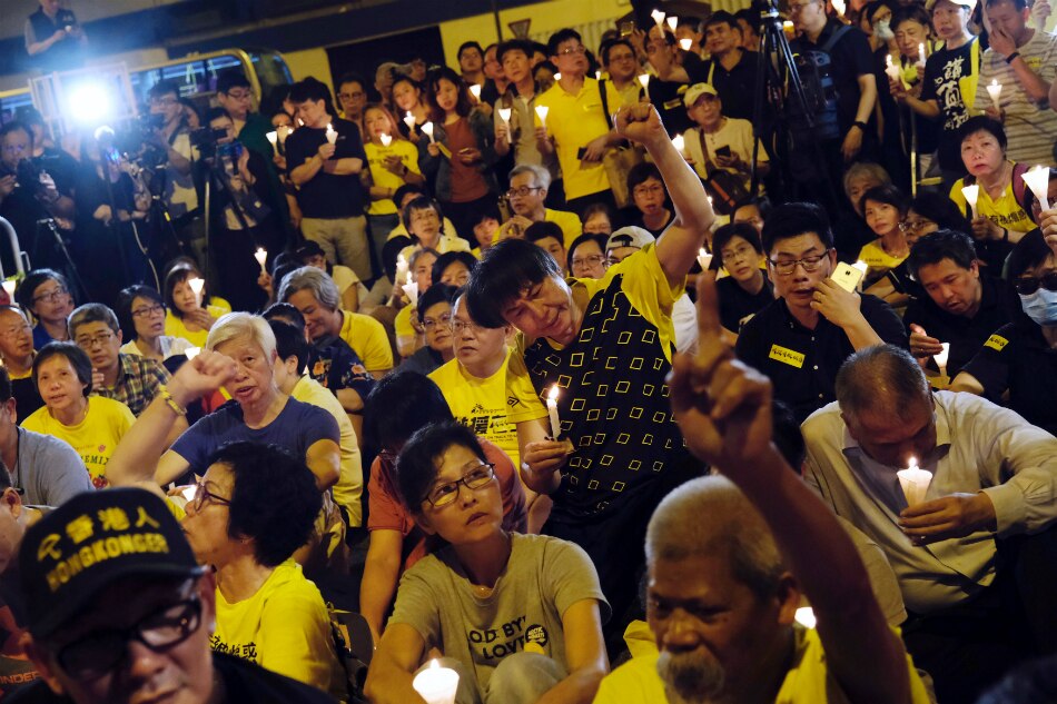 Hong Kong democracy leaders jailed over Umbrella Movement protests 1