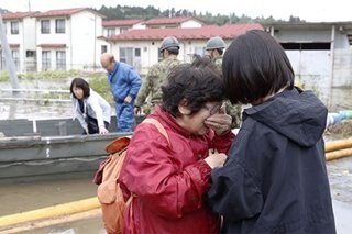 Japan rescuers still scrambling as typhoon toll nears 70