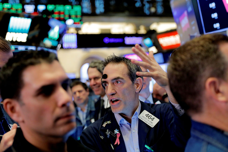 Traders work on the floor of the New York Stock Exchange after the opening bell in New York US. Lucas Jackson Reuters