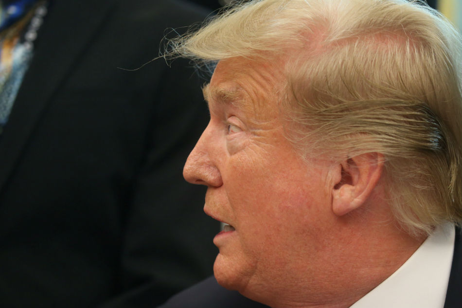 US President Donald Trump speaks at the Oval Office of the White House in Washington US