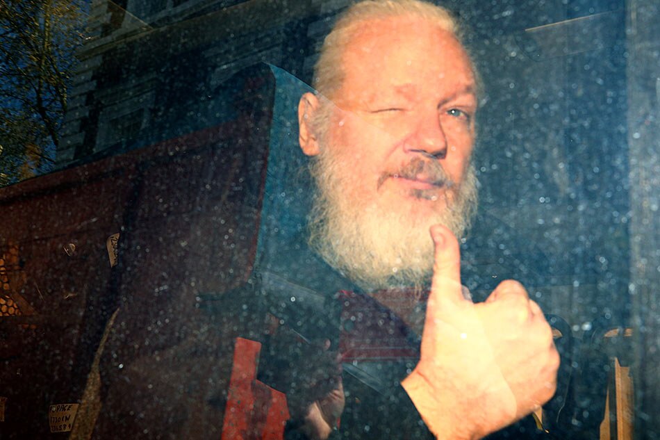 Assange jailed for 50 weeks for UK bail breach | ABS-CBN News