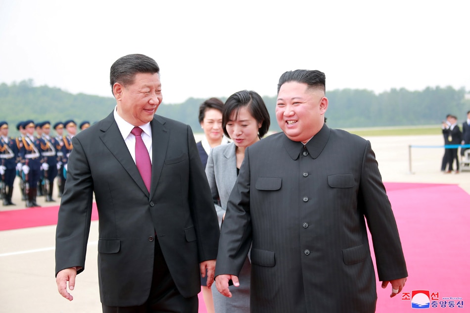 Leaders of China and North Korea vow to strengthen ties: KCNA 1