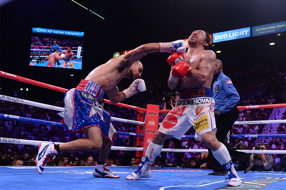 Pacquiao beats Thurman on split decision Pacquiao beats Thurman on split decision