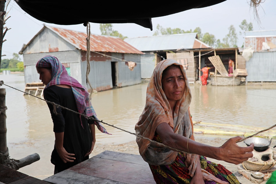 Bangladesh tries new way to aid flood-hit families: cash up front | ABS ...