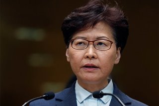 Hong Kong leader gets razor blade, threatening letter