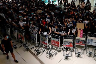 Hundreds of flights canceled in Hong Kong despite airport's restart