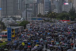 Hong Kong workers in crossfire as China pressures businesses