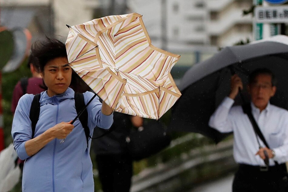 Strong typhoon winds lash Tokyo area, causing transport chaos ABSCBN