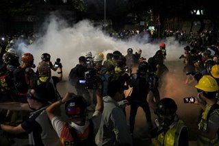 Hong Kong braces for airport protest after night of violent clashes