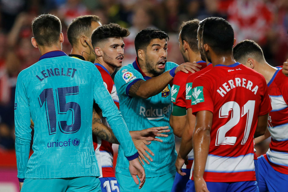 Football: Barcelona&#39;s poor start continues with defeat by Granada 1