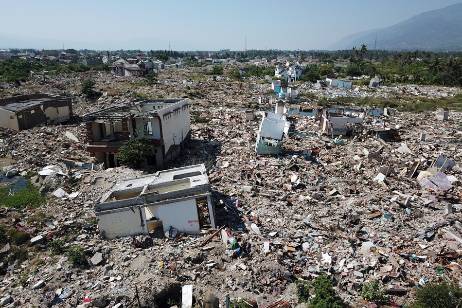 A year after Indonesia&#39;s quake-tsunami, survivors struggle to rebuild lives 1