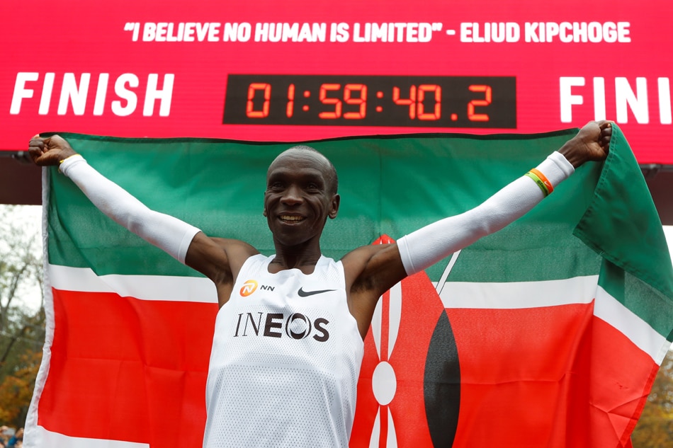 Kenyan man breaks mythical 2-hour marathon barrier 1