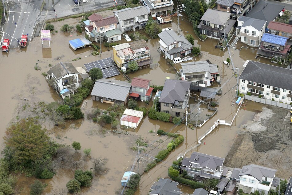 Rescuers hunt for missing as landslides, floods kill 10 in Japan 1