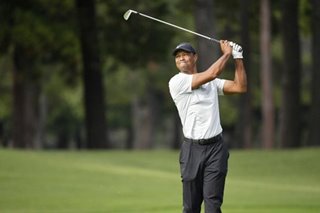 Golf: Tiger shocks himself with second 64 to lead by two