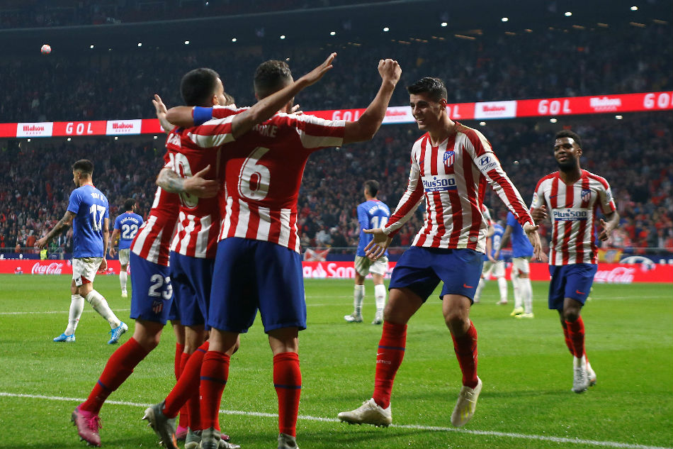 Football: Atletico return to winning ways to move level with Barca ...