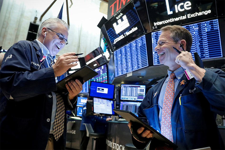 Traders work on the floor at the New York Stock Exchange in New York US Nov. 4 2019. Brendan McDermid Reuters