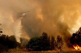 Australian firefighters battle widespread blazes, brace for worse conditions