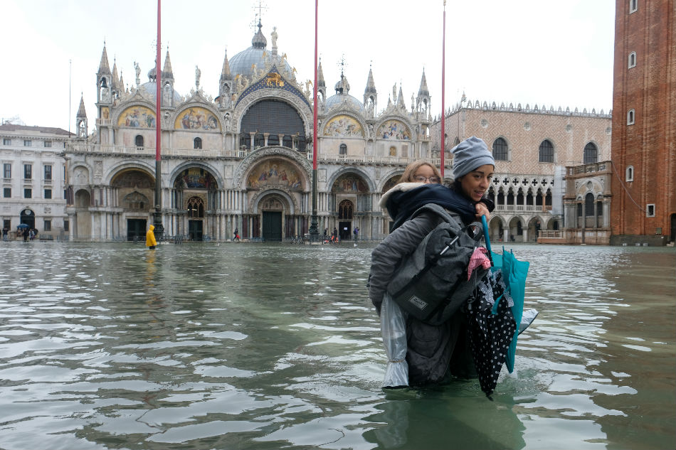 Venice underwater as exceptional tide sweeps through canal city | ABS ...