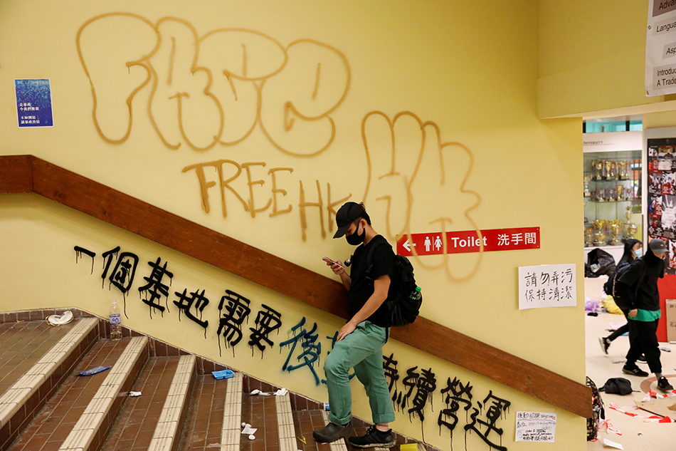 China says only it can rule on Hong Kong constitution 1
